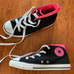 Converse All Star Mid Top. Too big for my daughter.